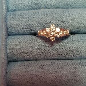 One 18k yellow gold and diamond flower ring.